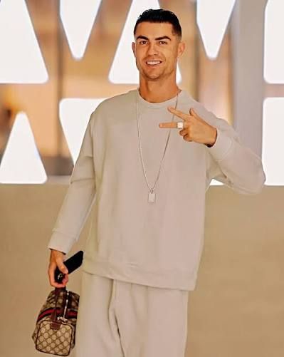 Outfit: Men's Light Grey Crewneck Sweatshirt, Men's Light Grey Sweatpants, Silver Chain Necklace with Pendant, White Ring