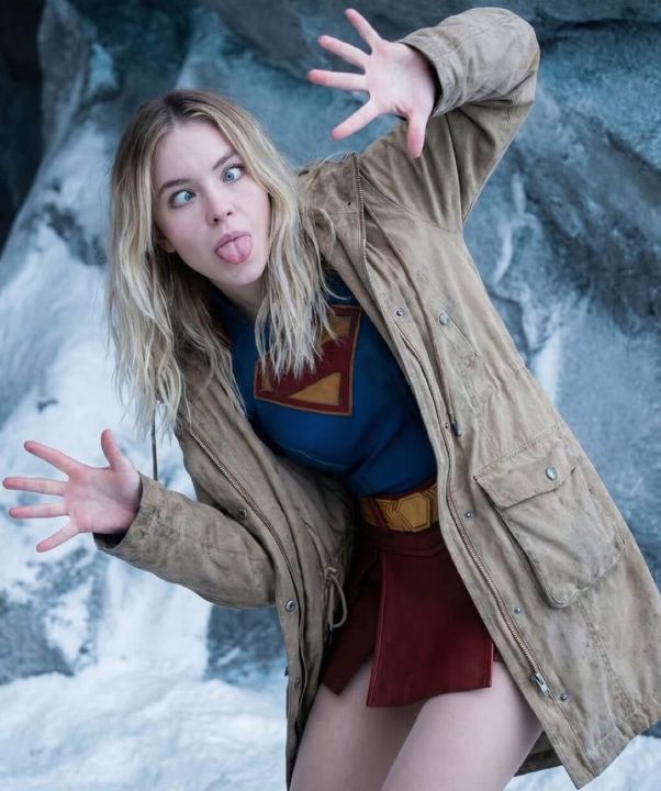 Outfit: Tan utility jacket, Supergirl costume top, Red mini skirt, Gold utility belt