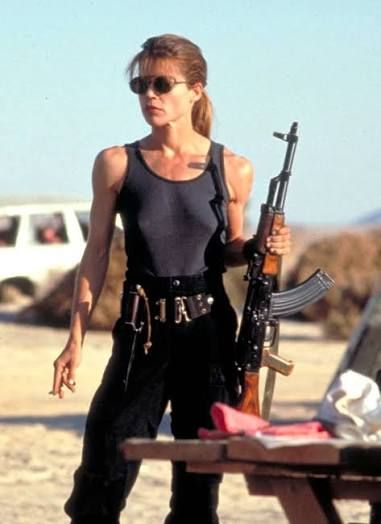 Outfit: Black Tank Top, Black Cargo Pants, Aviator Sunglasses, Tactical Utility Belt