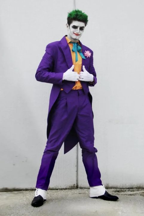 Outfit: Purple Tailcoat Jacket, Orange Dress Shirt, Teal Bow Tie, Pink Boutonnière