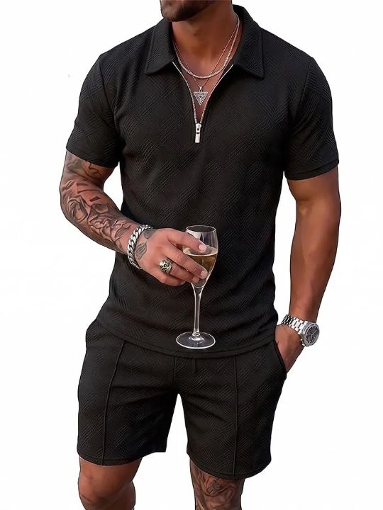 Outfit: Black textured polo shirt, Black textured shorts, Silver chain necklace, Silver pendant necklace