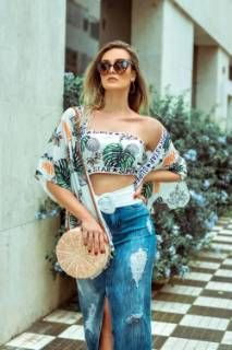 Outfit: Heart-shaped sunglasses, Gold hoop earrings, Tropical print bandeau top, Tropical print kimono