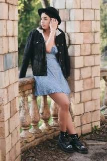 Outfit: Black fedora hat, Black denim sherpa jacket, Light blue floral mini dress, Black combat boots